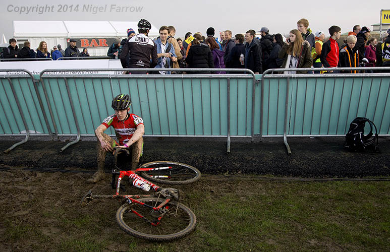 CYCLO X-Joseph Peatfield recovers after the junior men's race held before the 2014-2015 UCI Cyclo-Cross World Cup rounds at Campbell Park in Milton Keynes, Great Britain
