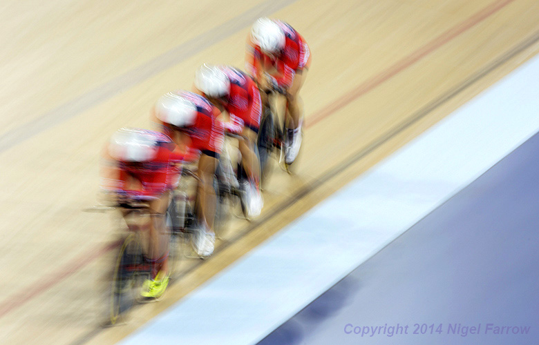 TRACK CYCLING-The USA team race around the track during qualifying for the Women's Team Pursuit at the 2014 UCI Track Cycling World Cup  in Stratford, London, Great Britain