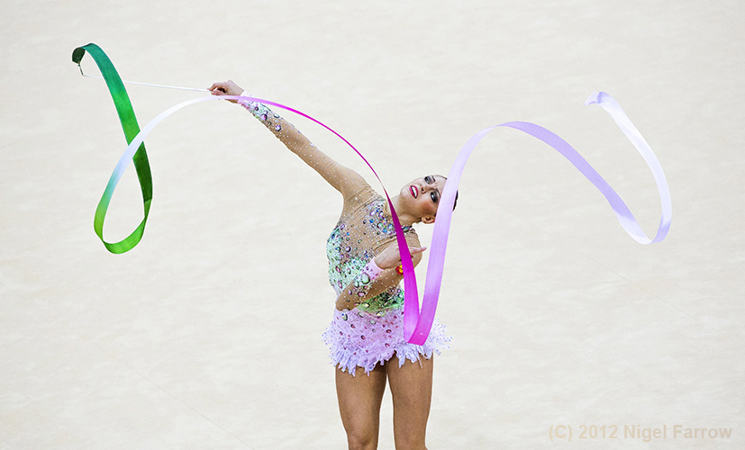 RHYTHMIC GYMNASTICS-Russia's Evgeniya Kanaeva performs her ribbon routine during the 2012 Olympic Games Individual All-Around final at Wembley Arena in London, Great Britain